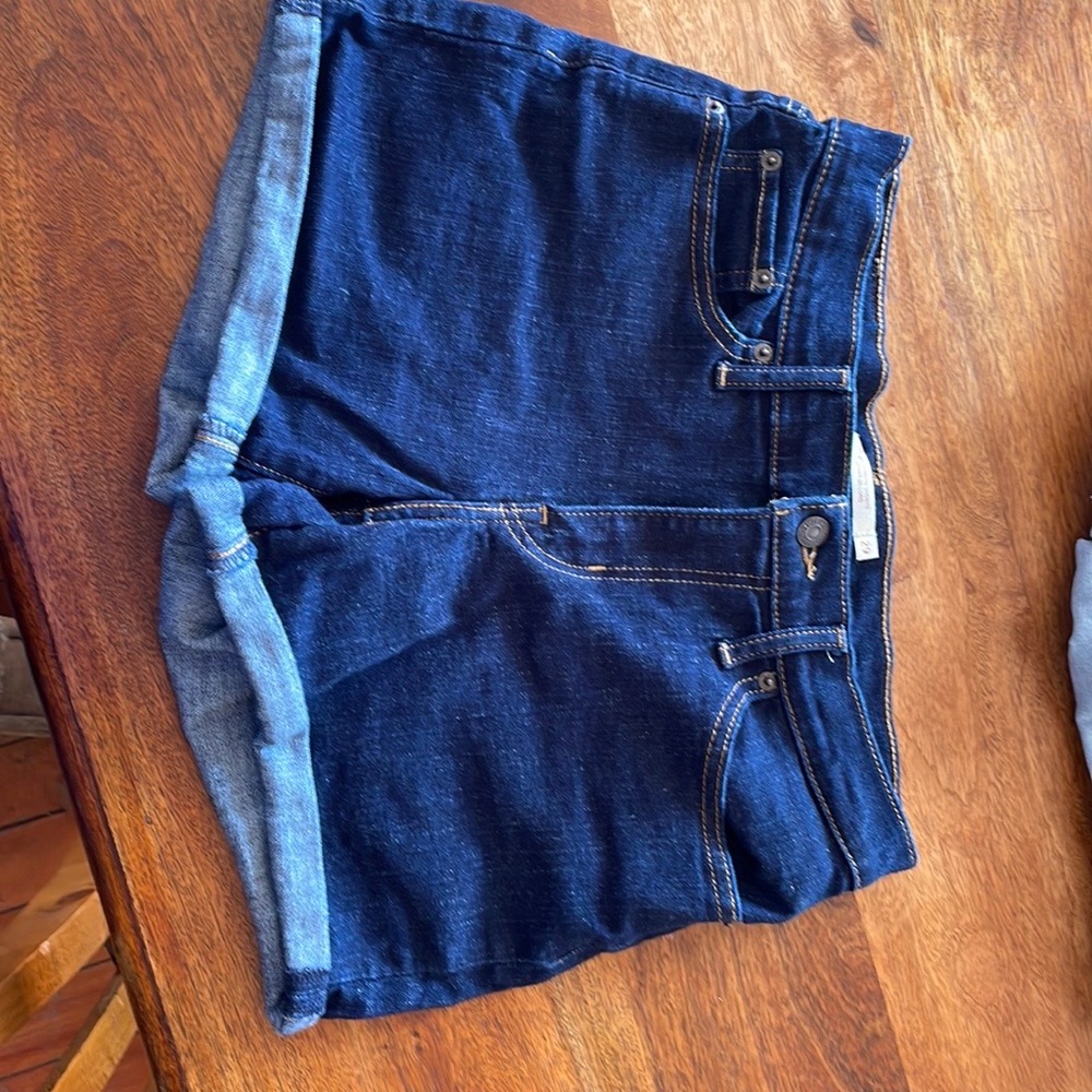 2 prs of Levi’s mid length shorts